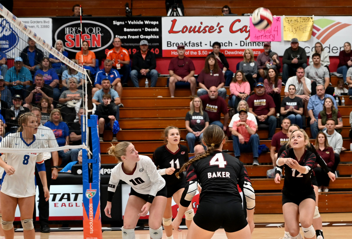 Baker senior Lily Adams (12) sets up a shot during the state Class 1A state championship match against Brandford at the FHSAA girls volleyball championships Tuesday at Polk State College in Winter Haven. 